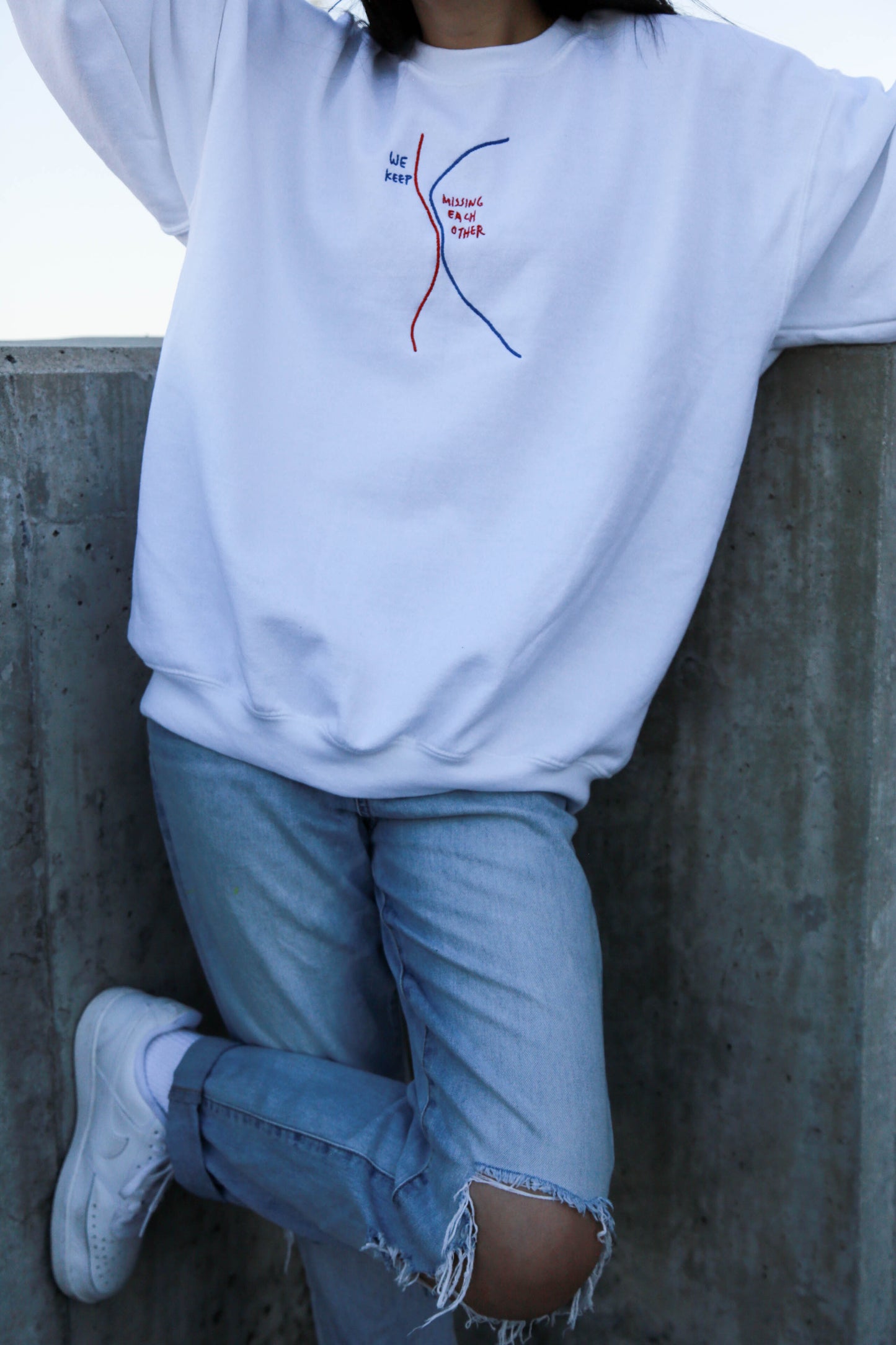 We Keep Missing Each Other Embroidered Crewneck